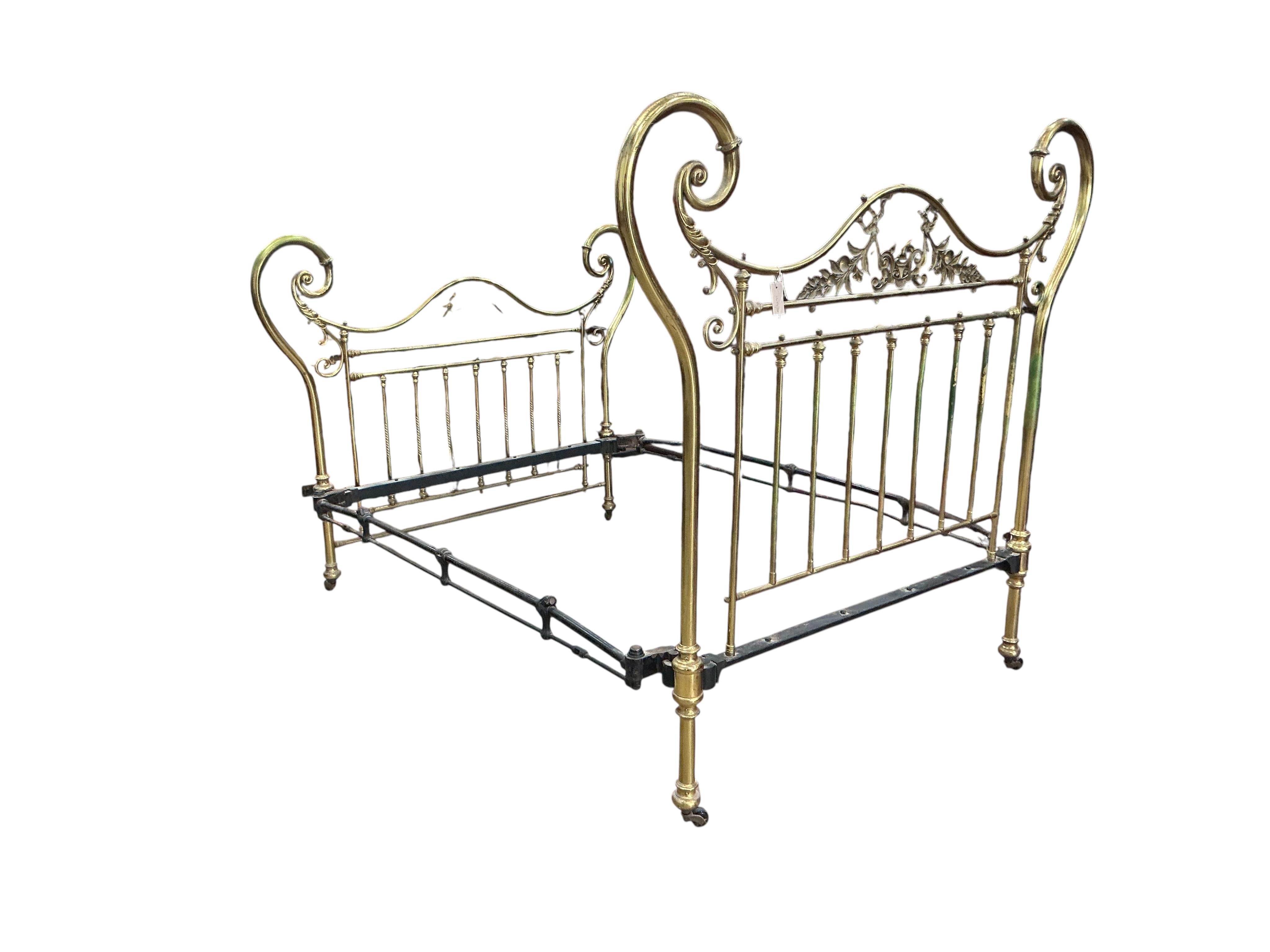 A late Victorian brass double bedframe, width 150cm, length 208cm, height 165cm